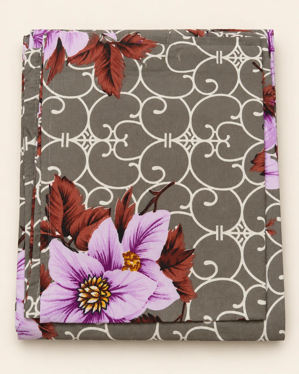 Lilac Scroll printed bedsheet, folded to show its design