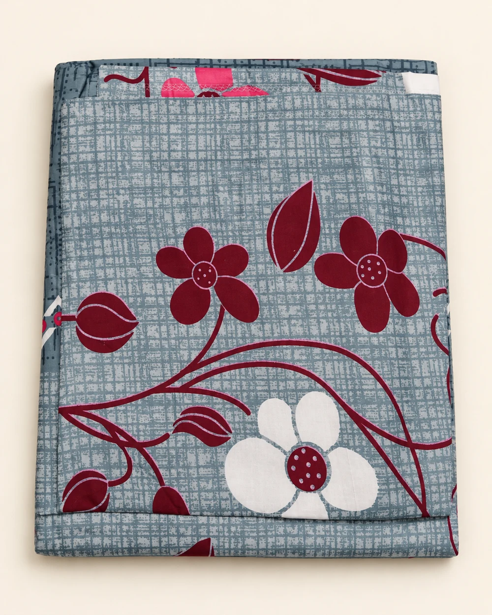 Berry Bloom printed bedsheet, folded to show its design