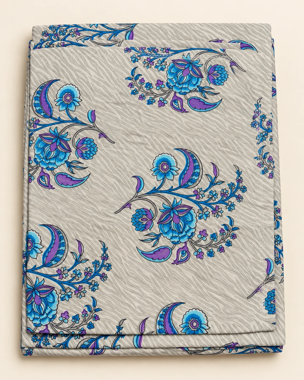 Azure Paisley printed bedsheet, folded to show its design